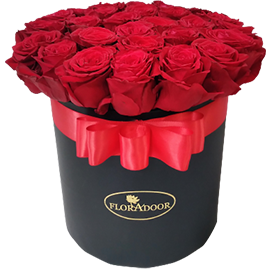 A flower box of red roses