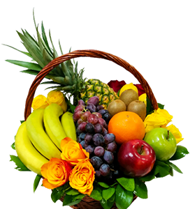 A gift basket of fruits with roses and greenery