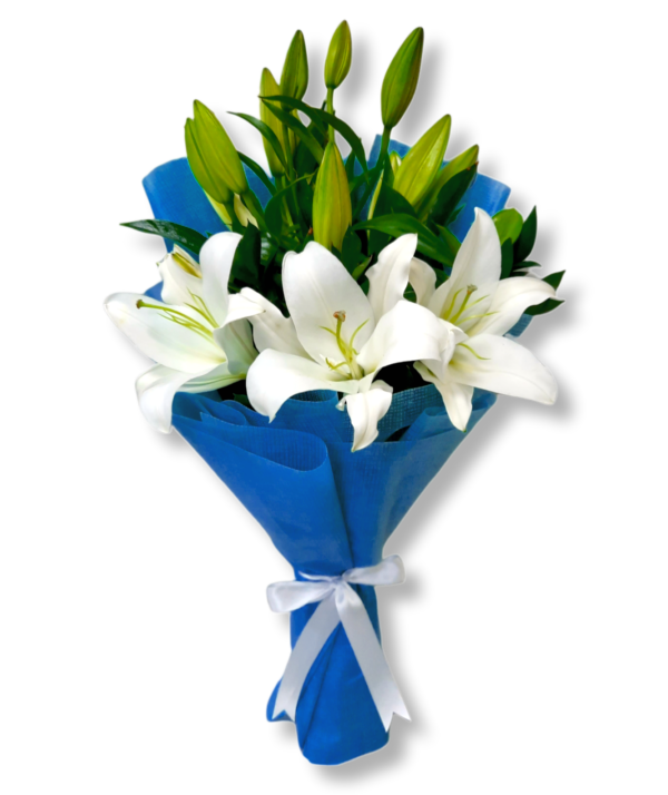 A flower bouquet of white lilies wrapped with blue paper and tied with a ribbon