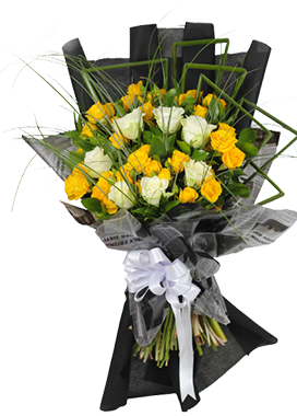 A flower bouquet of white and yellow roses with greenery