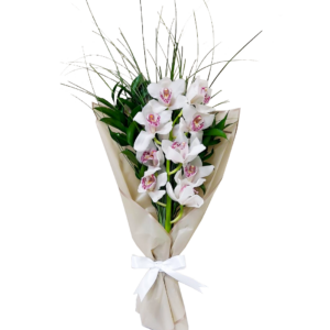 A flower bouquet for delivery in Egypt, with a white cymbidium orchid and green leaves, wrapped in a hand bouquet