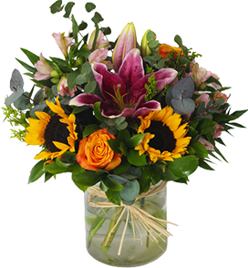 A flower vase of orange, yellow and pink flowers