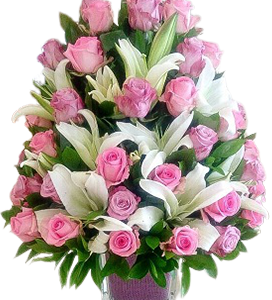 A flower vase of pink roses and white lilies