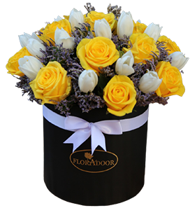flower box of yellow roses and white tulips