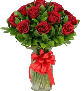 A flower vase with red roses and ruscus greenery tied with a big ribbon