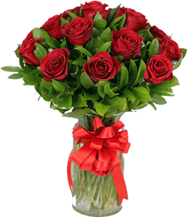 A flower vase with red roses and ruscus greenery tied with a big ribbon
